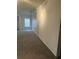 A modern living room with plush carpet and decorative trim throughout at 240 Villa Di Este Ter # 212, Lake Mary, FL 32746