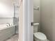 A bathroom featuring a soaking tub with a glass enclosed shower and a toilet room at 254 Cappella Ct, New Smyrna Beach, FL 32168