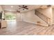 Open living space featuring tile floors, modern ceiling fans, and a view of the sparkling pool at 254 Cappella Ct, New Smyrna Beach, FL 32168