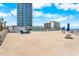 The amenity deck with chairs, tables, and access to other on-site activities at 2625 S Atlantic Ave # 18Nw, Daytona Beach, FL 32118