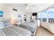 Bedroom featuring two beds, waterfront views, and coastal decor at 2625 S Atlantic Ave # 18Nw, Daytona Beach, FL 32118