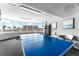 Game room with ping pong table, floor to ceiling windows, and ample seating at 2625 S Atlantic Ave # 18Nw, Daytona Beach, FL 32118