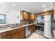 Modern kitchen equipped with stainless steel appliances, granite countertops, and ample cabinet space at 2625 S Atlantic Ave # 18Nw, Daytona Beach, FL 32118