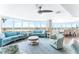 Spacious living room with ocean views, stylish seating, and open floor plan with dining area at 2625 S Atlantic Ave # 18Nw, Daytona Beach, FL 32118