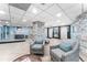 A view inside the building lobby with seating, decor, and elevator access at 2625 S Atlantic Ave # 18Nw, Daytona Beach, FL 32118