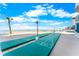Outdoor shuffleboard courts with ocean views on a sunny day, surrounded by manicured landscape at 2625 S Atlantic Ave # 18Nw, Daytona Beach, FL 32118