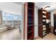 Walk-in closet with custom shelving offers plenty of storage and waterfront views at 2625 S Atlantic Ave # 18Nw, Daytona Beach, FL 32118
