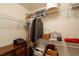 Walk-in closet with built-in shelving at 265 Minorca Beach Way # 902, New Smyrna Beach, FL 32169