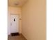 Neutral hallway leading to the front door at 265 Minorca Beach Way # 902, New Smyrna Beach, FL 32169