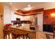 Spacious kitchen featuring granite countertops, breakfast bar and modern appliances at 265 Minorca Beach Way # 902, New Smyrna Beach, FL 32169