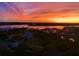 Sunset image of the area around 265 Minorca Beach Way condominium with bright orange and yellow sky at 265 Minorca Beach Way # 902, New Smyrna Beach, FL 32169