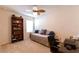 Bedroom with daybed, desk, bookcase, and a window at 2818 Taton Trce, New Smyrna Beach, FL 32168