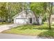 Charming single-story home with a well-maintained lawn and an attached two-car garage at 2822 Brookline Ave, New Smyrna Beach, FL 32168