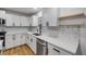 Bright kitchen featuring white cabinets, stainless steel appliances at 2822 Brookline Ave, New Smyrna Beach, FL 32168