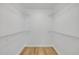 Spacious walk-in closet with built-in wire shelving for storage at 2822 Brookline Ave, New Smyrna Beach, FL 32168