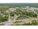 An aerial view of the property featuring a pond and trees at 2917 Crockett Pt, Sanford, FL 32773