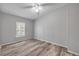 Bedroom with hardwood floors and natural light at 2917 Crockett Pt, Sanford, FL 32773