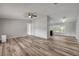 Spacious living room featuring modern flooring and lots of natural light at 2917 Crockett Pt, Sanford, FL 32773