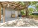 Covered patio with storage shed at 2917 Crockett Pt, Sanford, FL 32773
