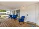 Inviting front porch with cozy seating and charming accents, like plants at 2917 Crockett Pt, Sanford, FL 32773