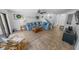Bright living room with comfortable furniture, a cozy rug, and access to outdoor spaces at 2961 Oceans Trce, Daytona Beach Shores, FL 32118