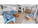 Spacious living room with an open floor plan, tile flooring, and stylish furnishings at 2961 Oceans Trce, Daytona Beach Shores, FL 32118