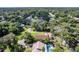 Spacious neighborhood with mature trees surrounding properties. Home shown has additional covered parking area at 3048 Mango Tree Dr, Edgewater, FL 32141
