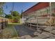 Covered boat storage with gravel drive and fenced yard at 3048 Mango Tree Dr, Edgewater, FL 32141