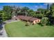 Charming single-story home with lush landscaping and well-maintained lawn in a desirable neighborhood at 3048 Mango Tree Dr, Edgewater, FL 32141