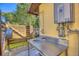 Outdoor sink and shower, featuring a stainless-steel countertop, perfect for rinsing off after outdoor activities at 3048 Mango Tree Dr, Edgewater, FL 32141