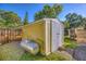 A storage shed sits in the backyard, offering secure storage space with a propane tank situated nearby at 3048 Mango Tree Dr, Edgewater, FL 32141