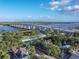 Elevated view of the bridge, showcasing its architecture amidst verdant greenery and the tranquil waters of the river at 306 Sheldon St, New Smyrna Beach, FL 32168
