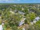 A residential neighborhood featuring tree-lined streets, well-maintained houses, and serene atmosphere at 3120 Mango Tree Dr, Edgewater, FL 32141
