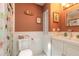 Cozy bathroom featuring vintage-style fixtures and charming decor at 3120 Mango Tree Dr, Edgewater, FL 32141