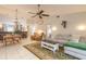 Spacious living room with seamless transition to the kitchen and dining areas at 3120 Mango Tree Dr, Edgewater, FL 32141
