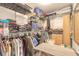 Spacious walk-in closet with ample shelving and hanging space for organized storage at 3120 Mango Tree Dr, Edgewater, FL 32141