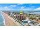 Beautiful aerial view of the beachfront condo building with pool and ocean views at 3245 S Atlantic Ave # 208, Daytona Beach, FL 32118