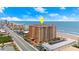 Aerial view showcases prime beachfront location near the city at 3245 S Atlantic Ave # 208, Daytona Beach, FL 32118