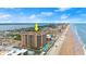 Aerial view of condo location on beach with ocean, bay, and city views at 3245 S Atlantic Ave # 208, Daytona Beach, FL 32118