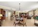 Inviting dining area boasts seamless connectivity to the kitchen and living room, ideal for modern living at 3245 S Atlantic Ave # 208, Daytona Beach, FL 32118