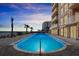 Beautiful pool with lounge seating and ocean view near condominium at 3245 S Atlantic Ave # 208, Daytona Beach, FL 32118