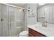 Bathroom featuring a large walk-in shower, modern fixtures, and a single sink vanity at 3378 Leonardo Ln, New Smyrna Beach, FL 32168