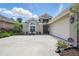 Charming single-story home featuring a well-maintained lawn and covered entryway, enhancing its curb appeal at 3378 Leonardo Ln, New Smyrna Beach, FL 32168