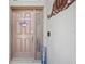 Charming front door with glass and star decoration, offering curb appeal at 3378 Leonardo Ln, New Smyrna Beach, FL 32168