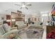 Spacious living room featuring tile flooring, recessed lighting, and comfortable seating at 3378 Leonardo Ln, New Smyrna Beach, FL 32168