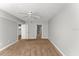 A spacious bedroom with neutral paint, carpet flooring, and a ceiling fan at 3425 S Atlantic Ave # 902, Daytona Beach, FL 32118
