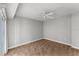 Bedroom featuring neutral paint, carpet flooring, and a ceiling fan at 3425 S Atlantic Ave # 902, Daytona Beach, FL 32118
