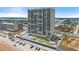 Exterior of the highrise oceanfront building with a pool and beach access at 3425 S Atlantic Ave # 902, Daytona Beach, FL 32118