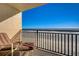 Oceanfront balcony offering breathtaking views of the sandy beach and clear blue ocean at 4139 S Atlantic Ave # A302, New Smyrna Beach, FL 32169