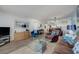 Cozy living room featuring comfortable seating, stylish decor, and an open layout for relaxed living at 4139 S Atlantic Ave # A302, New Smyrna Beach, FL 32169